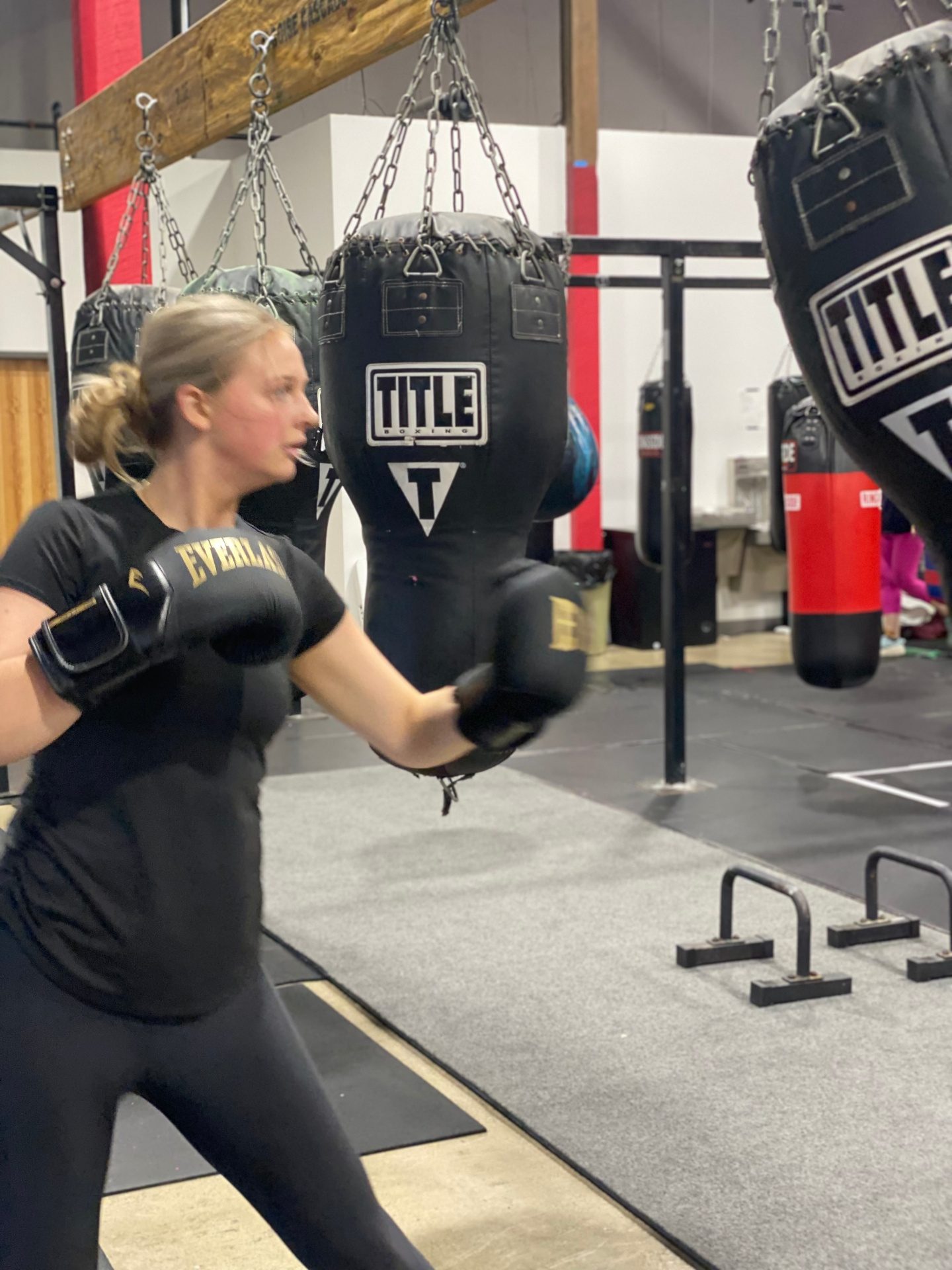 Eden's Peak client training on the heavy bag